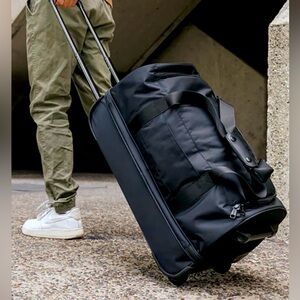 Calpak Stevyn Rolling Duffle Black NWT